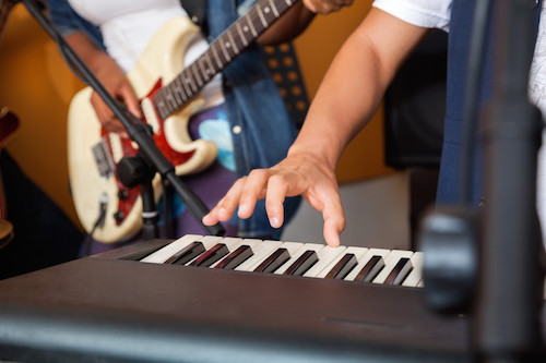 Piano keyboard and guitar