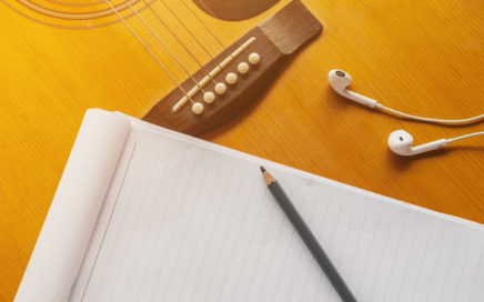 Guitar and music paper - Songwriting