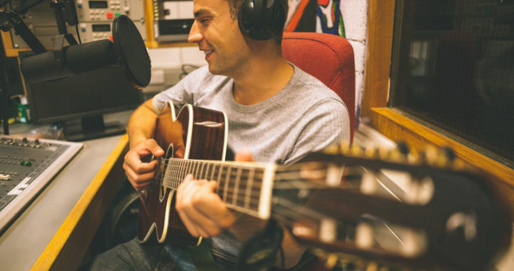 Singer-Songwriter in Recording Studio