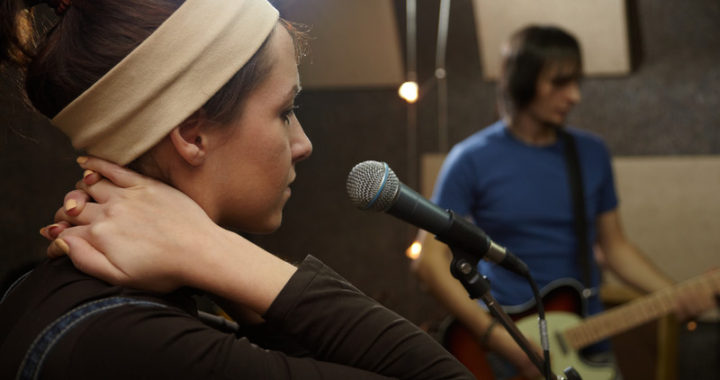 Singer in a recording studio