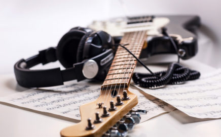 Guitar, headphones and music