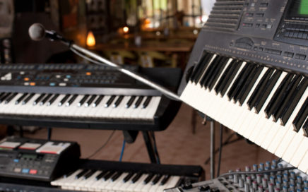 synthesizer keyboards on stage